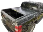 Waterproof manual truck bed cover partially open