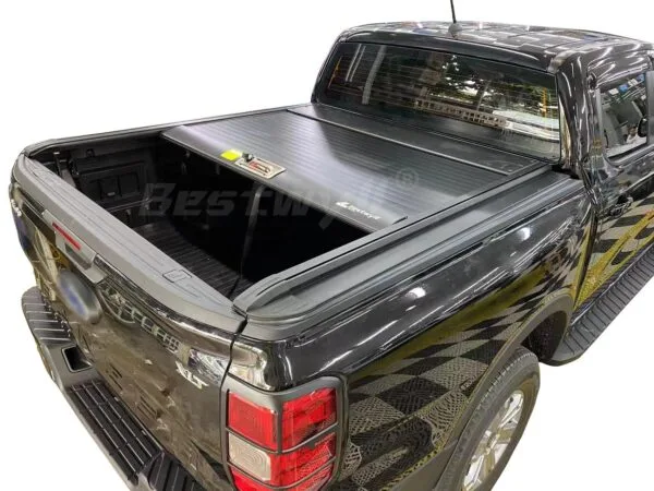 Waterproof manual truck bed cover partially open