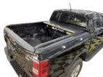 Waterproof manual truck bed cover fully retracted