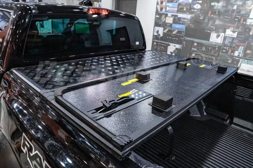 Hard tri-fold tonneau cover installed on RAM