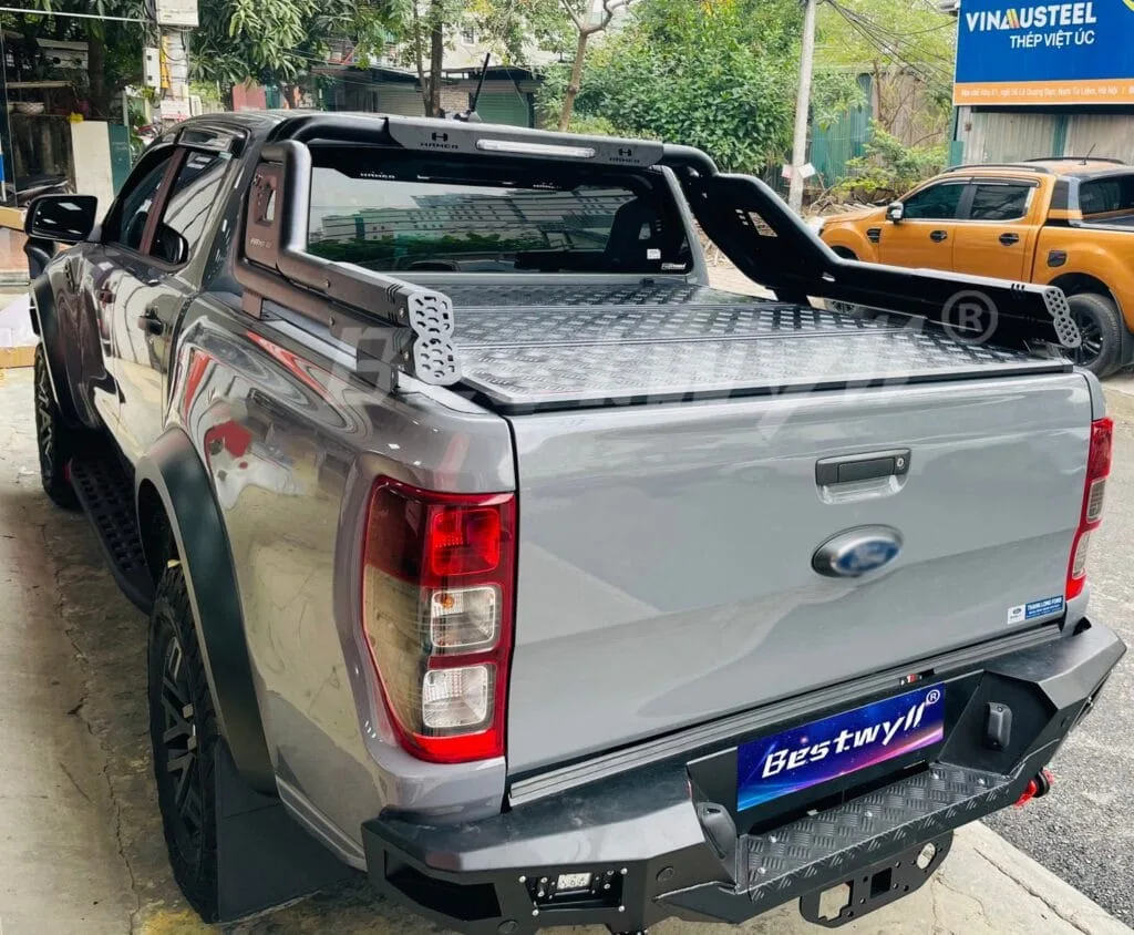 Hard tri-fold tonneau cover installed on Ford