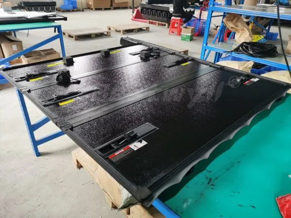 Hard tri fold truck bed cover